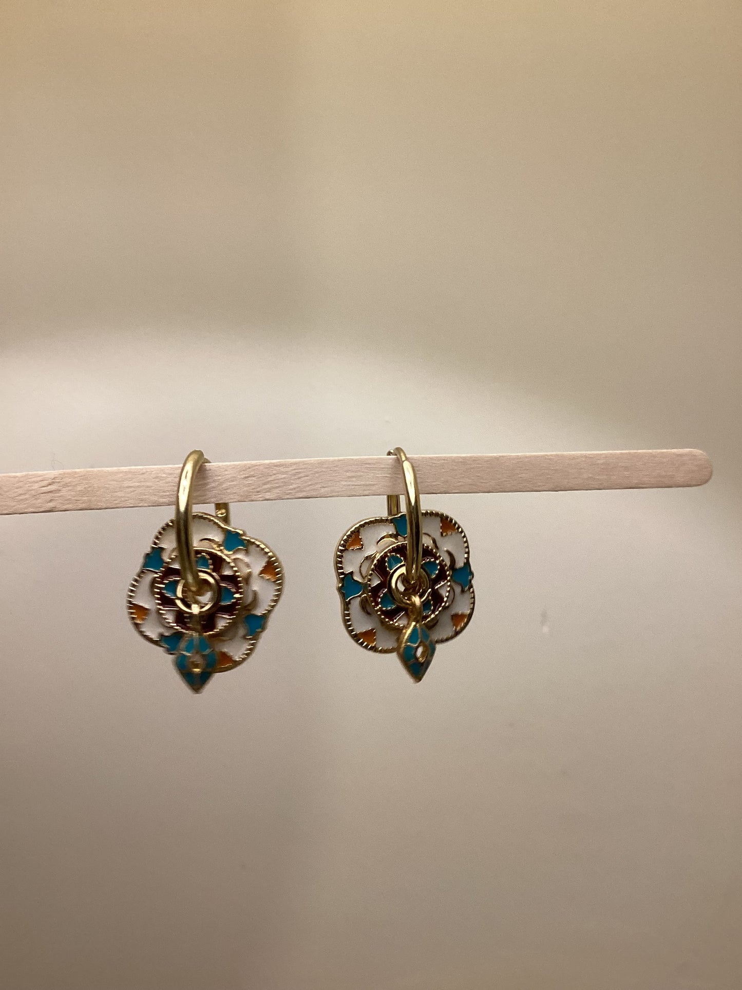 Mood swings Trado Charms Earrings